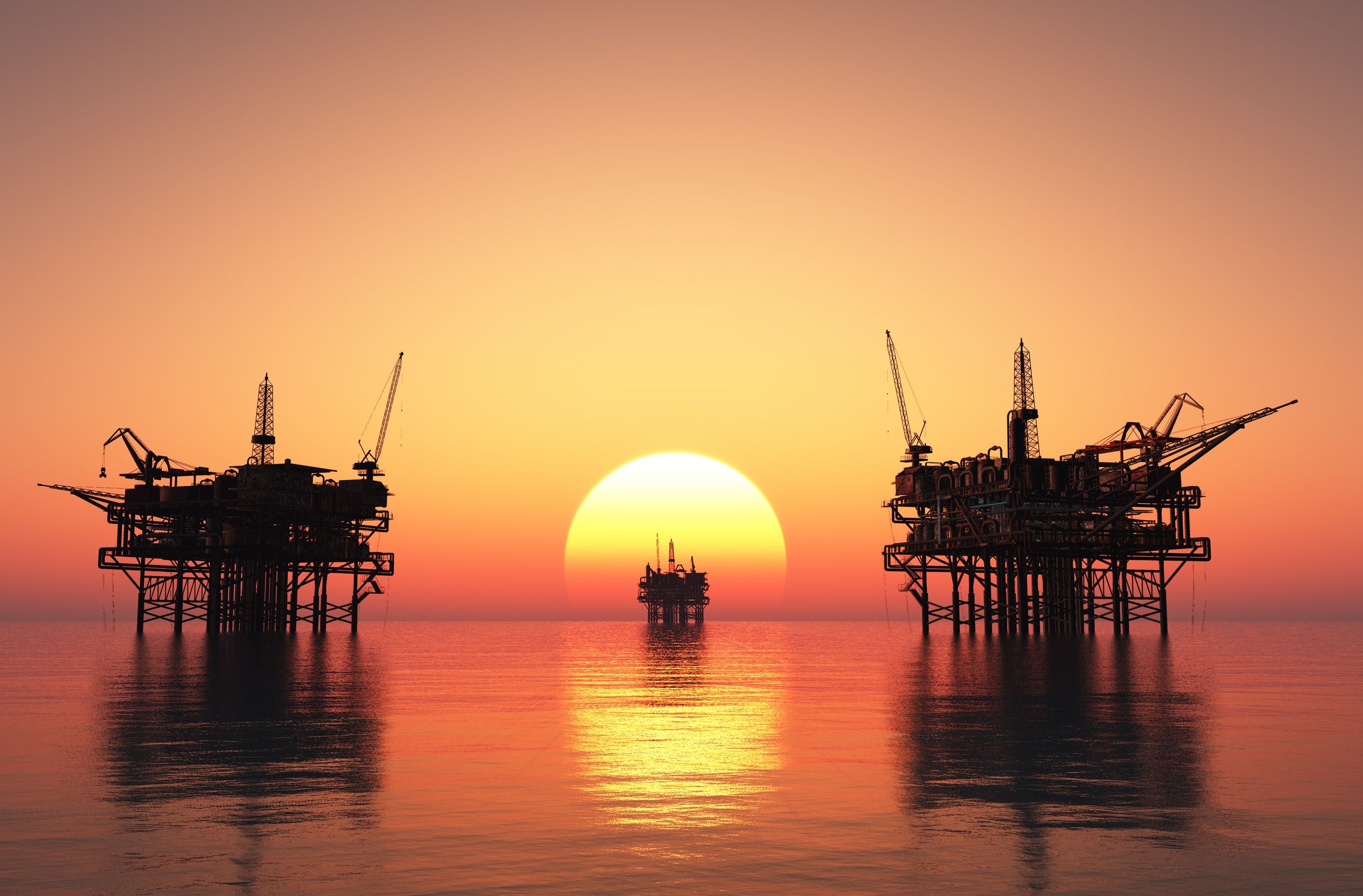 Буровая промышленность. Нефтедобывающая платформа «нефтяные камни». Кувейт Энерджи. Нефтяная вышка. Нефтяная платформа на закате.